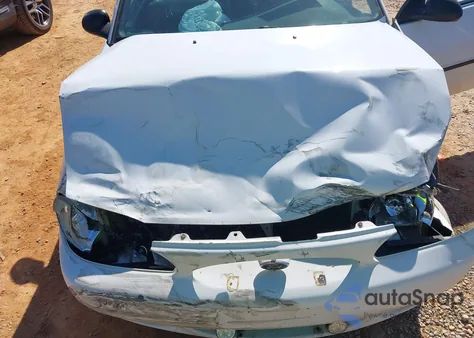 1999 Ford Escort Lx из США, поврежденный, VIN 1FAFP10P1XW236632